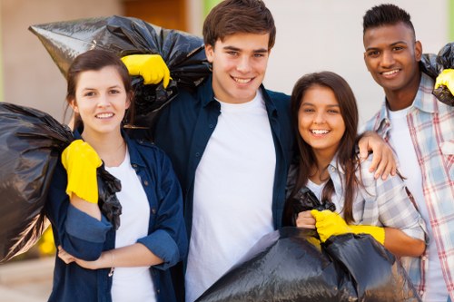 Community members participating in local waste removal
